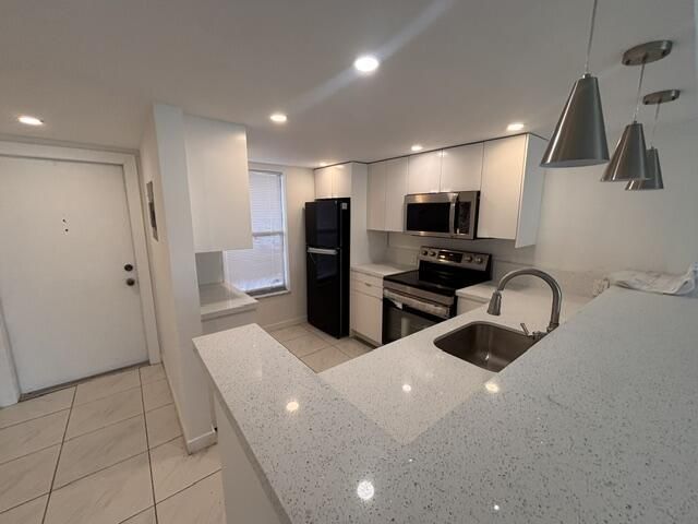 6051 NW 61st Avenue, Unit 103, Tamarac, FL 33319 Photo