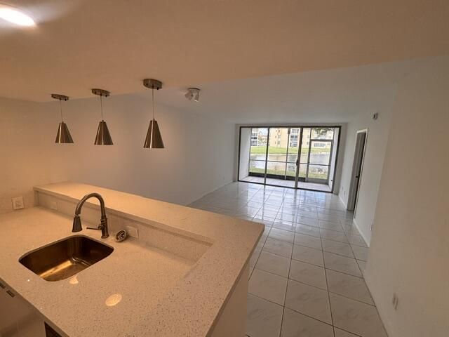 6051 NW 61st Avenue, Unit 103, Tamarac, FL 33319 Photo