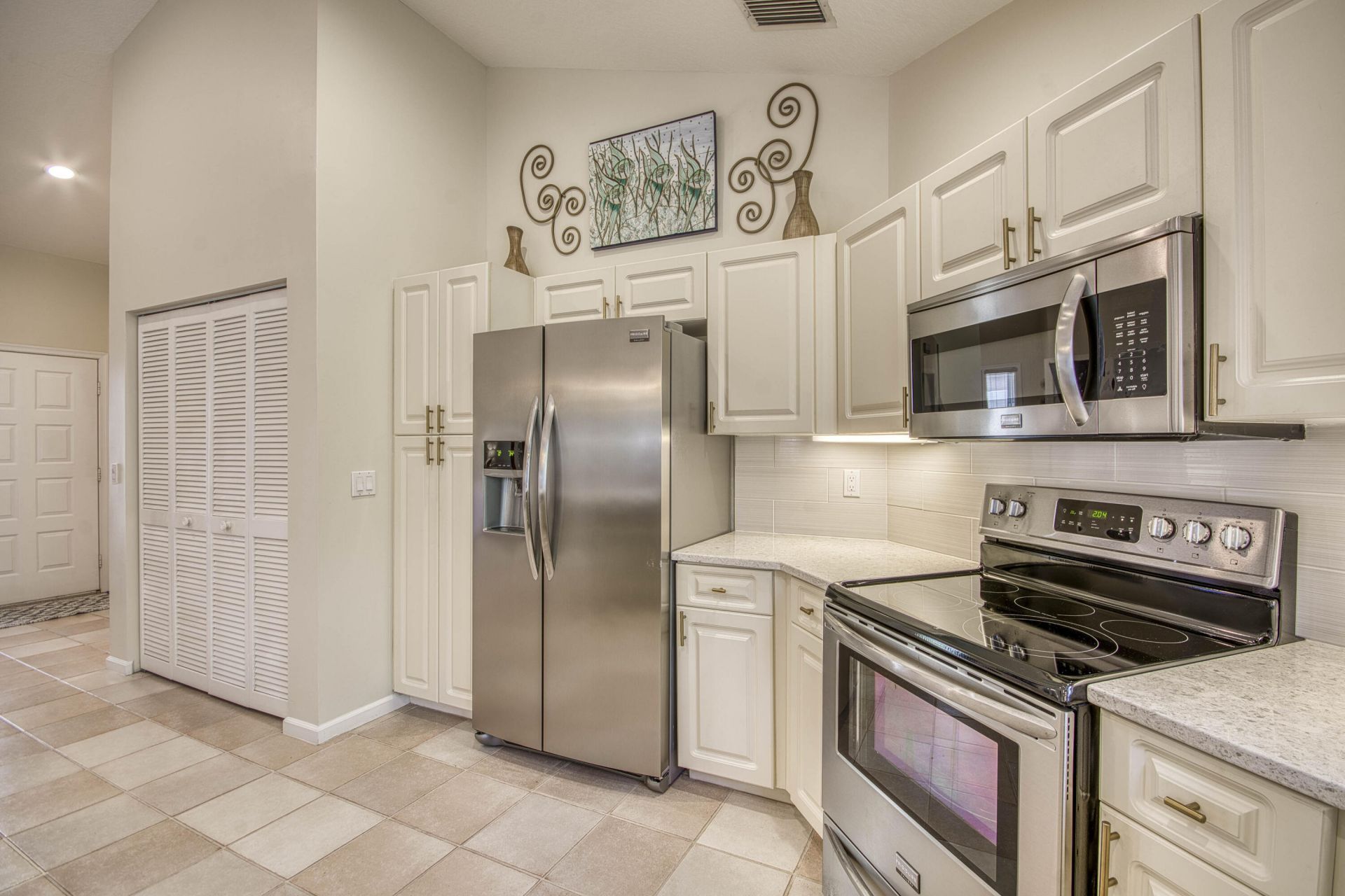 206 Canterbury Drive W, Palm Beach Gardens, FL 33418 Photo