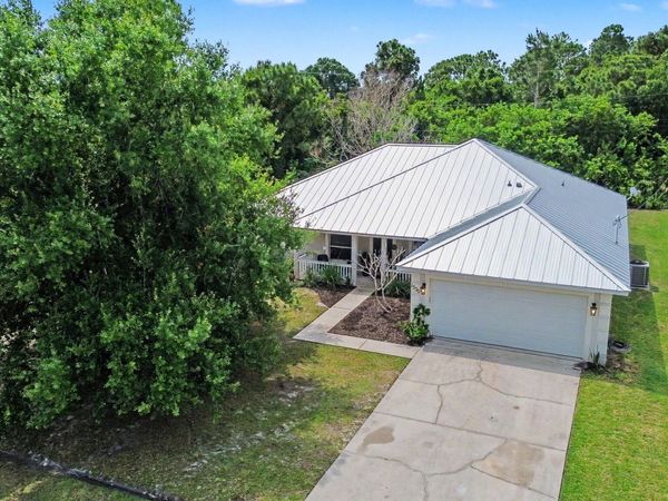 1550 SW Kosnar Avenue, Port St. Lucie, FL 34953