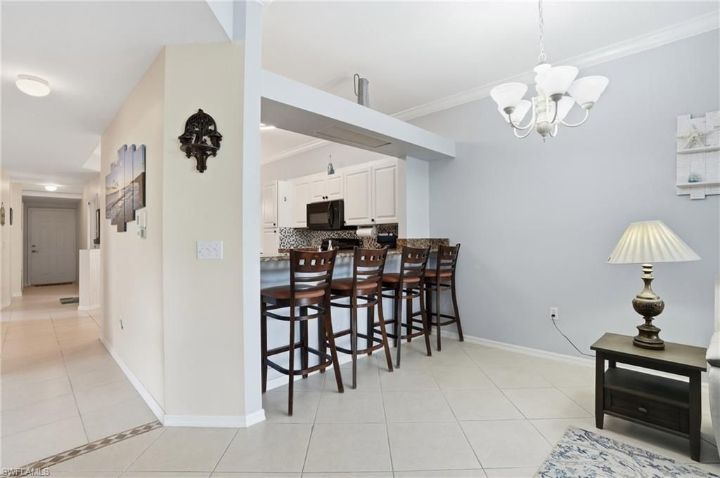 340 Robin Hood Cir, Unit 102, Naples, FL 34104 Photo