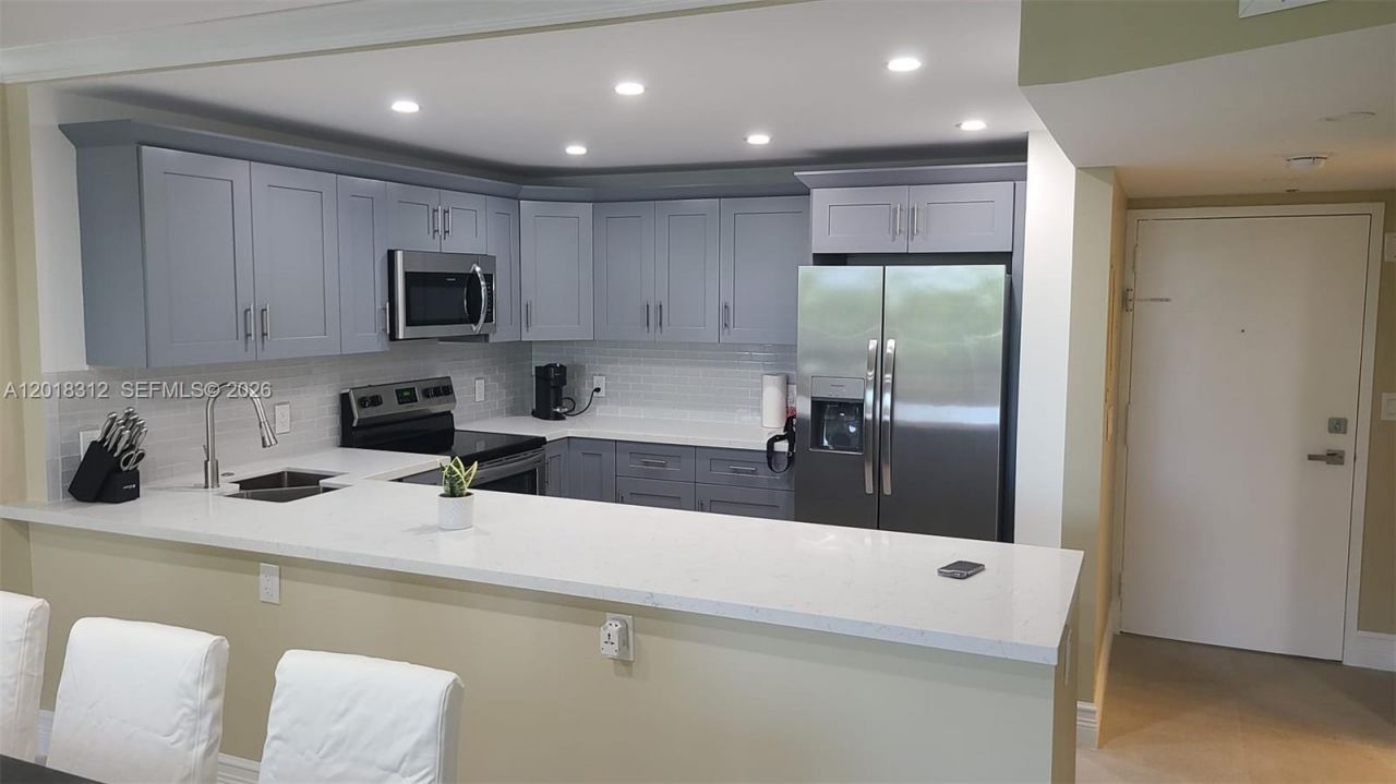 100 Golden Isles Dr , Unit 409, Hallandale Beach, FL 33009 Photo
