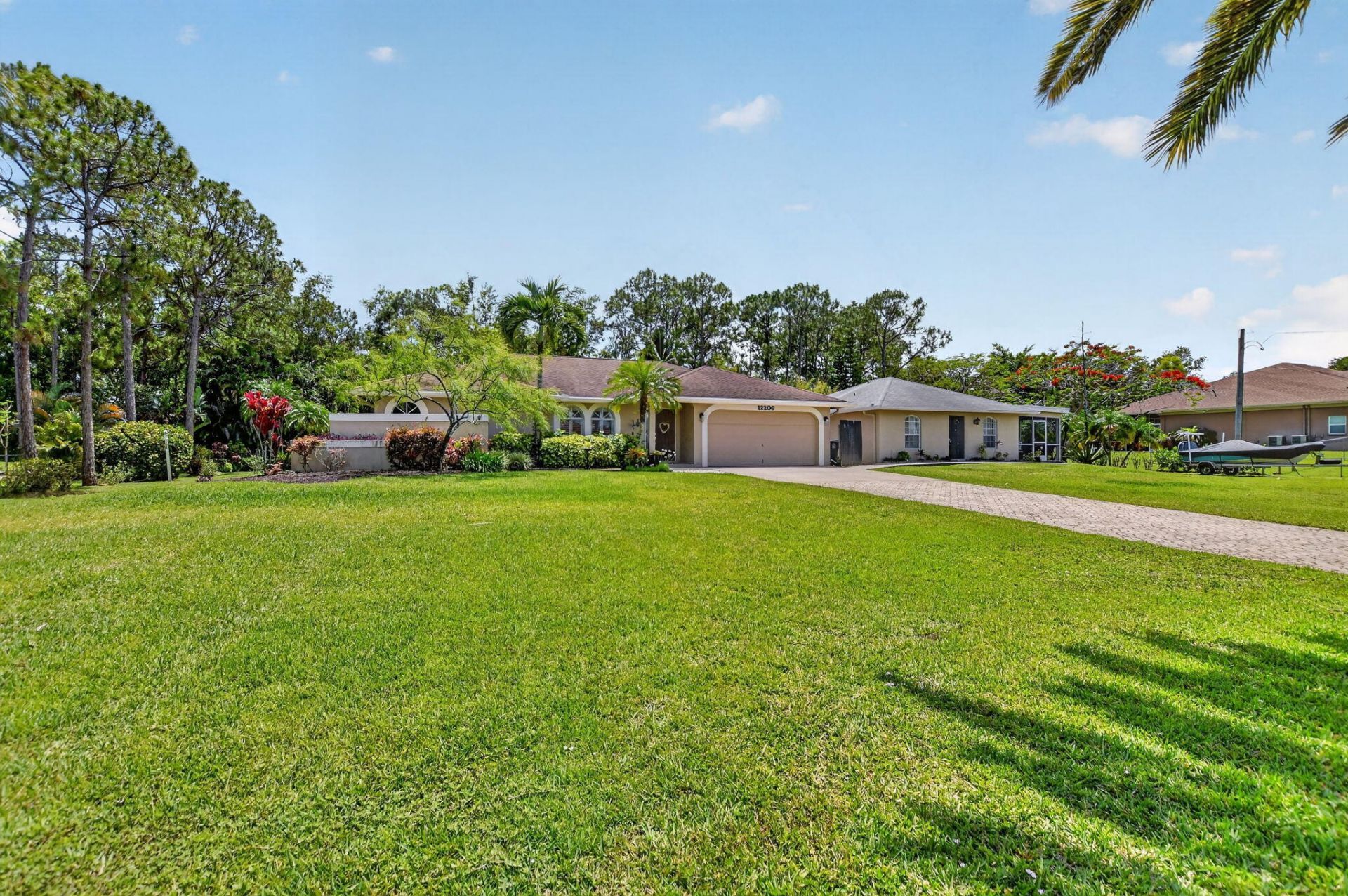 12206 Temple Boulevard, The Acreage, FL 33412 Photo