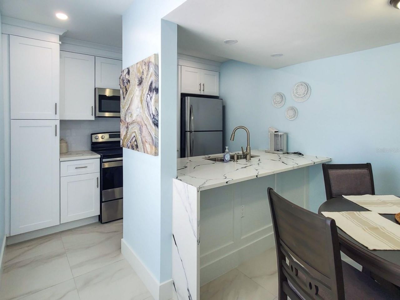 215 Medallion Boulevard, Unit G, Madeira Beach, FL 33708 Photo