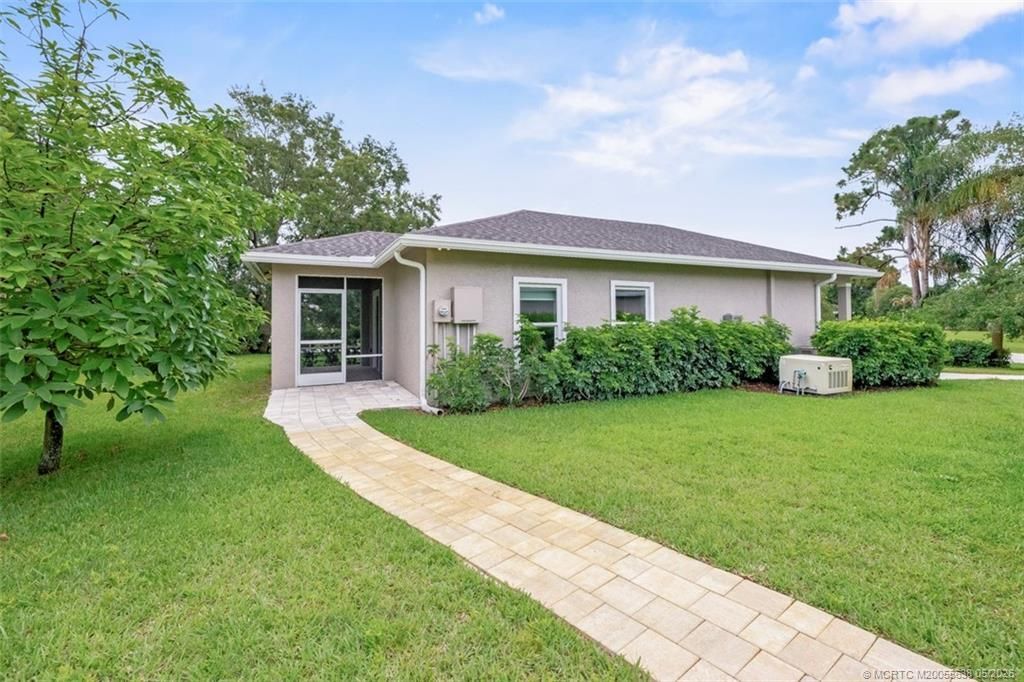 2671 NE Pinecrest Lakes Boulevard, Jensen Beach, FL 34957 Photo