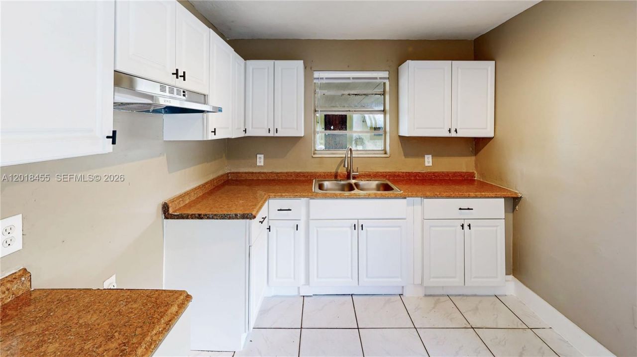 2760 NW 58th St , Miami, FL 33142 Photo