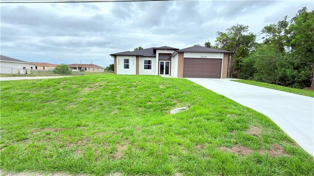 3114 6th St W, Lehigh Acres, FL 33971 Photo