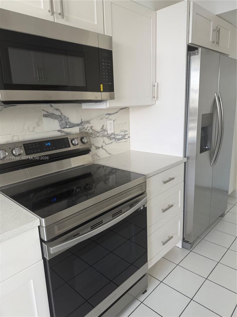 100 Golden Isles Dr , Unit 313, Hallandale Beach, FL 33009 Photo