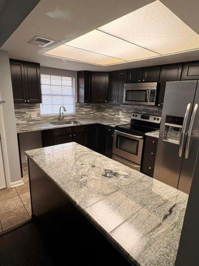 4014 Ashford Green Place, Unit G202, Tampa, FL 33613 Photo