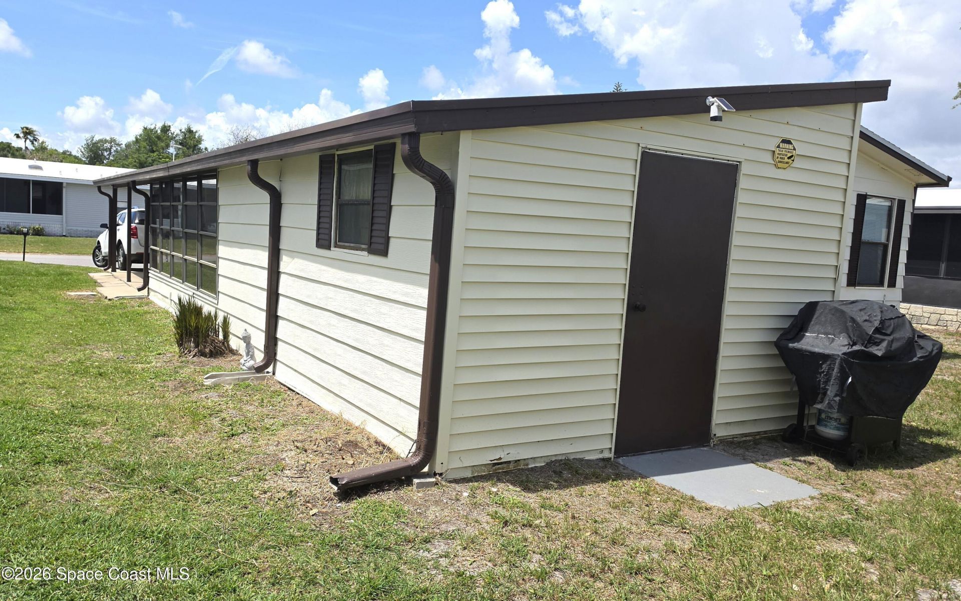 259 S Dolphin Circle , Barefoot Bay, FL 32976 Photo