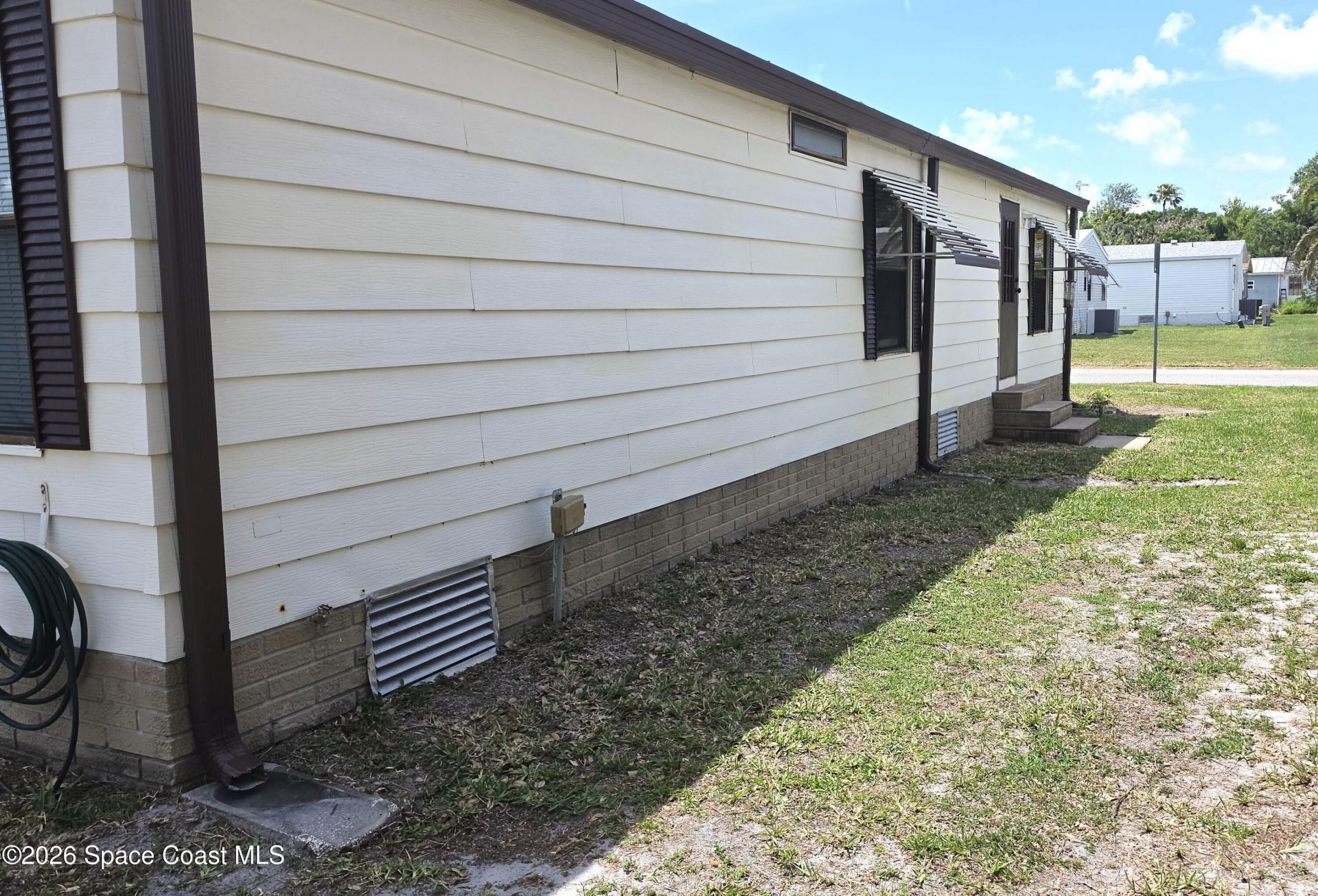 259 S Dolphin Circle , Barefoot Bay, FL 32976 Photo