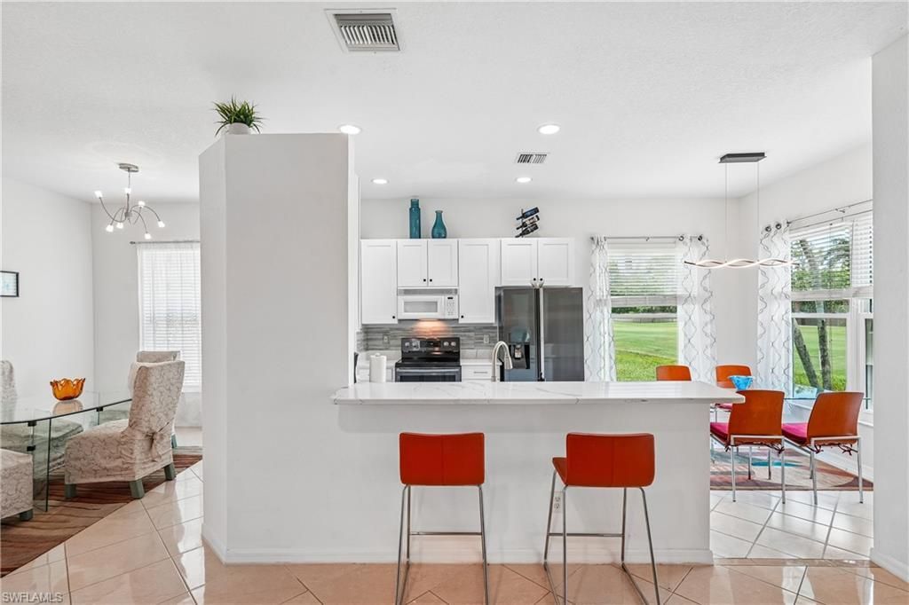 309 Harvard Ln , Naples, FL 34104 Photo