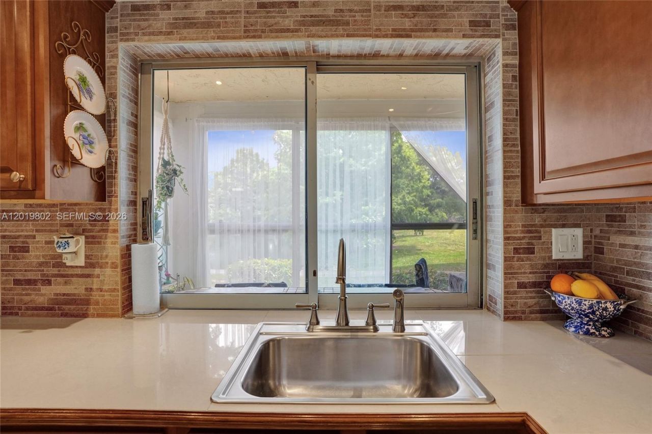 9070 Lime Bay Blvd , Unit 110, Tamarac, FL 33321 Photo
