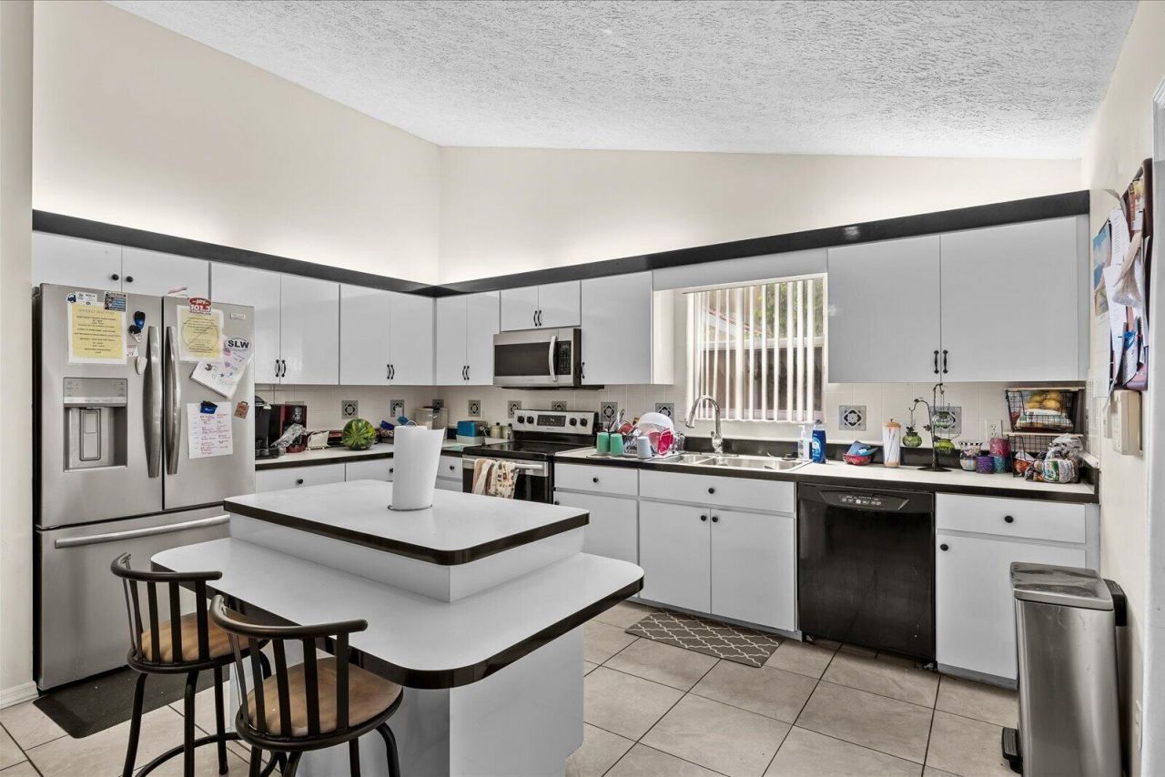 1341 SW Maplewood Drive, Port Saint Lucie, FL 34986 Photo