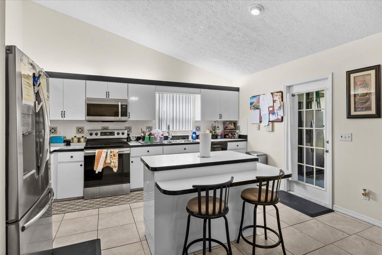 1341 SW Maplewood Drive, Port Saint Lucie, FL 34986 Photo