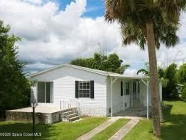 818 Thrush Circle , Barefoot Bay, FL 32976