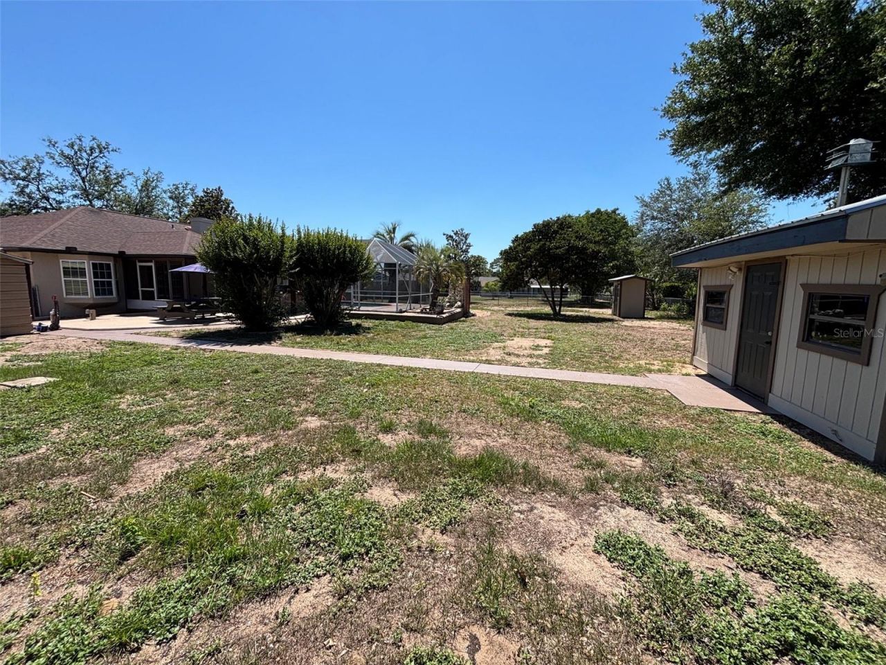 9801 SE Sunset Harbor Road, Summerfield, FL 34491 Photo