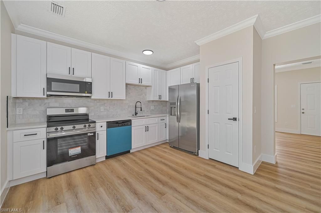 1076/1078 Ainsworth St E, Lehigh Acres, FL 33974 Photo