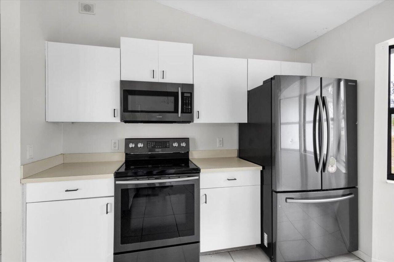 1097 SW Mcdevitt Avenue, Port Saint Lucie, FL 34953 Photo