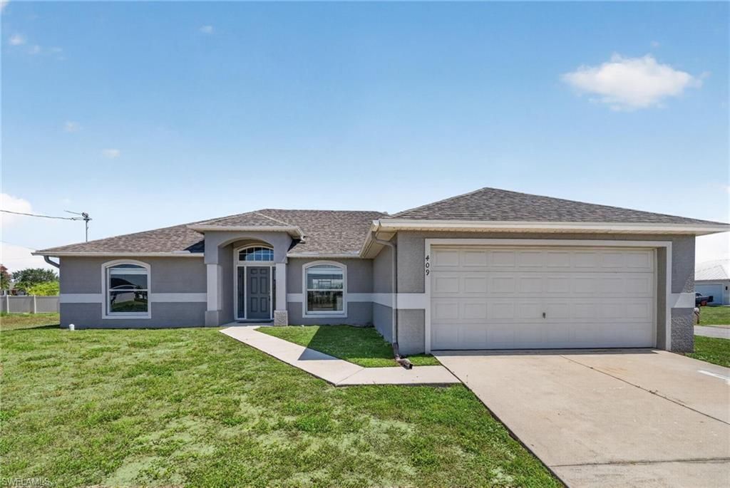 409 NE 25th Ter, Cape Coral, FL 33909 Photo