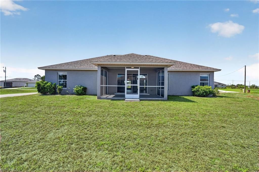 409 NE 25th Ter, Cape Coral, FL 33909 Photo