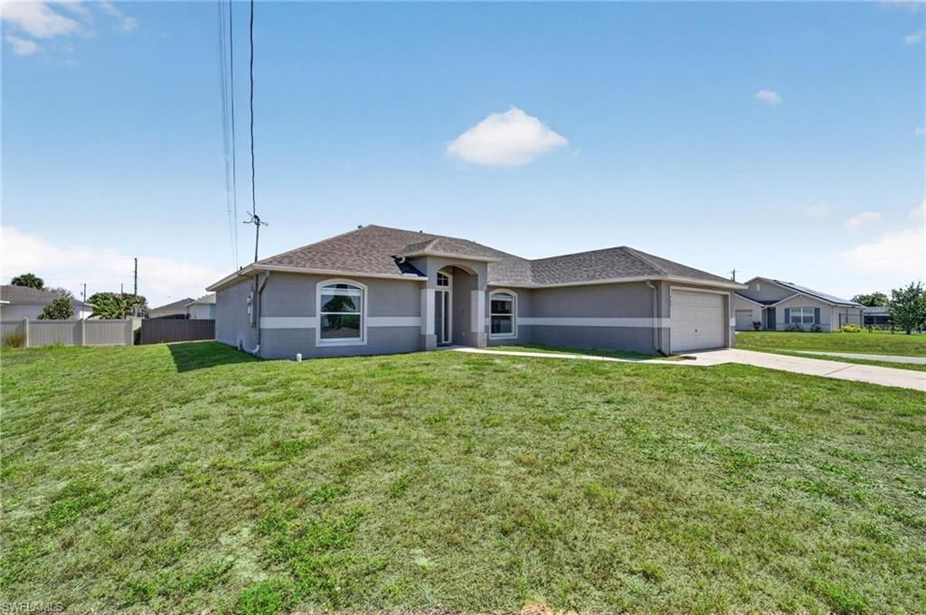 409 NE 25th Ter, Cape Coral, FL 33909 Photo