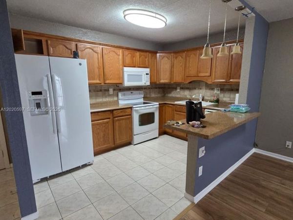 4133 NW 88th Ave, Unit 102, Coral Springs, FL 33065