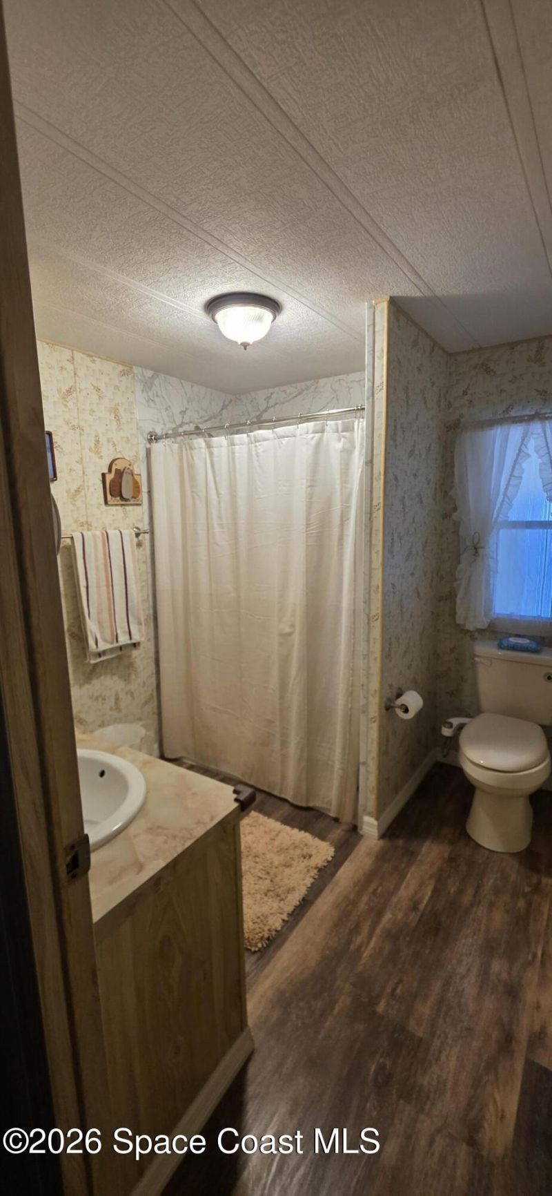 579 N Dolphin Circle , Barefoot Bay, FL 32976 Photo
