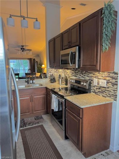 181 Grand Oaks Way, Unit Q203, Naples, FL 34110 Main Photo