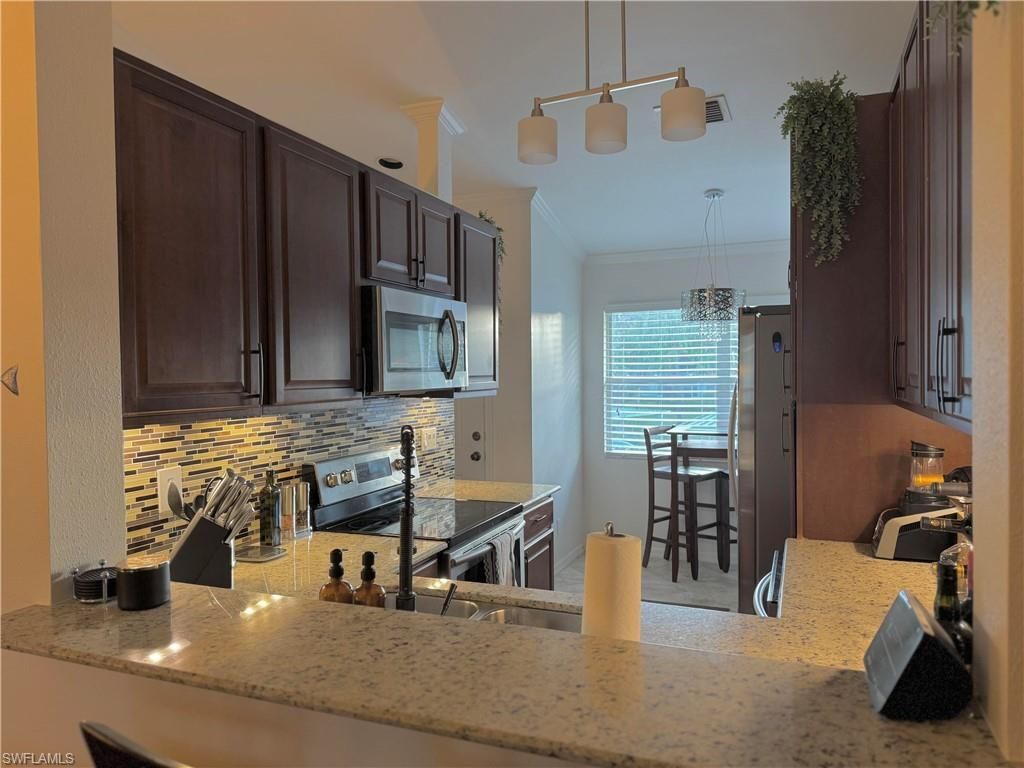 181 Grand Oaks Way, Unit Q203, Naples, FL 34110 Photo