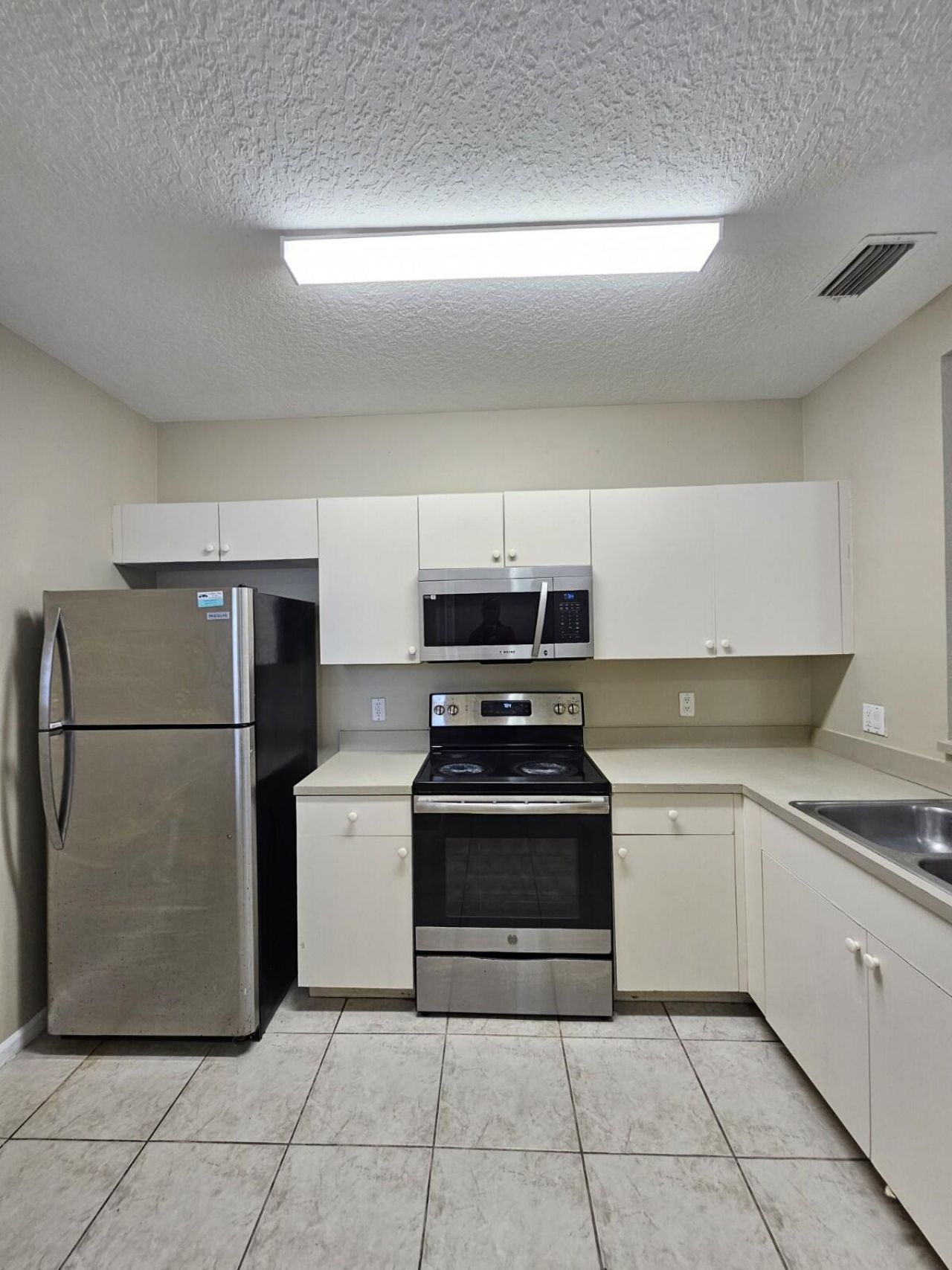 1063 Golden Lakes Boulevard, Unit 322, West Palm Beach, FL 33411 Photo
