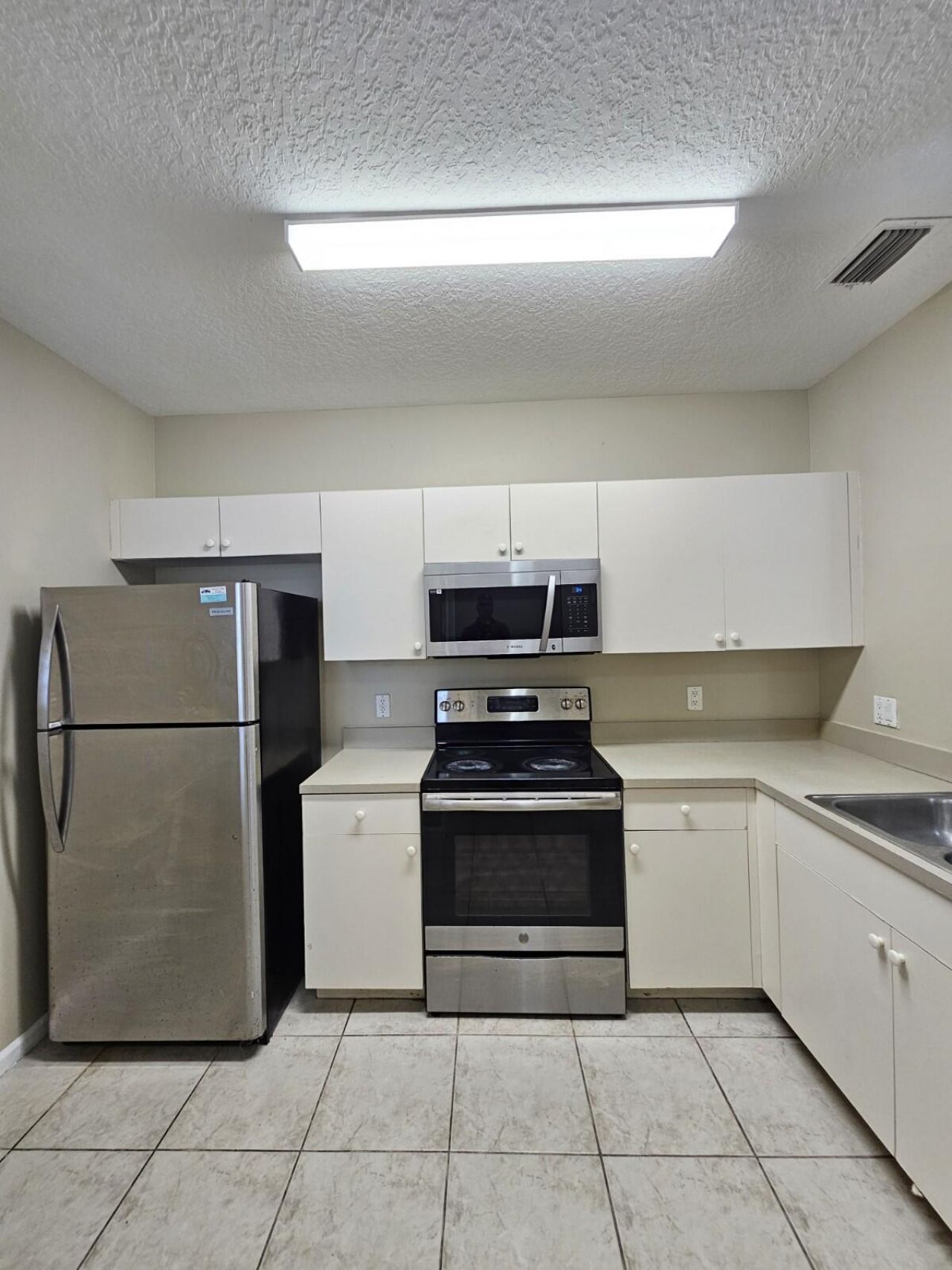 1063 Golden Lakes Boulevard, Unit 322, West Palm Beach, FL 33411 Photo