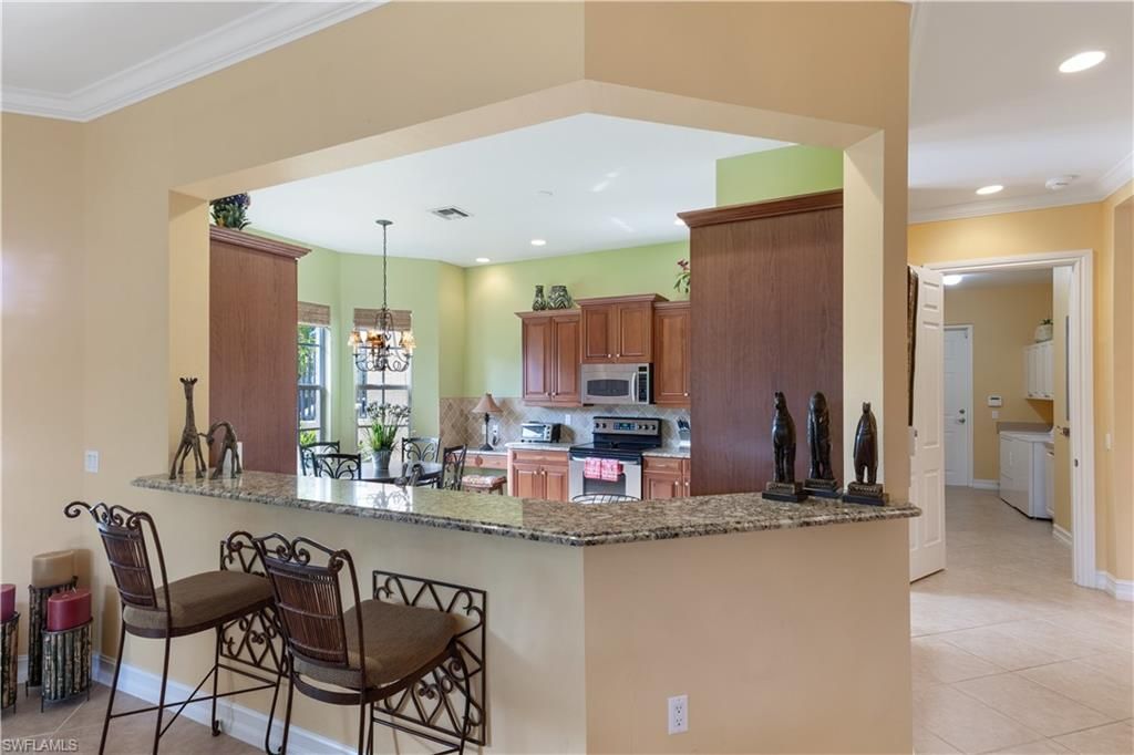 5050 Blauvelt Way, Unit 8-102, Naples, FL 34105 Photo