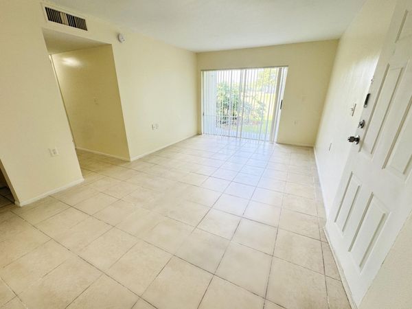 1101 N Benoist Farms Road, Unit 106, West Palm Beach, FL 33411