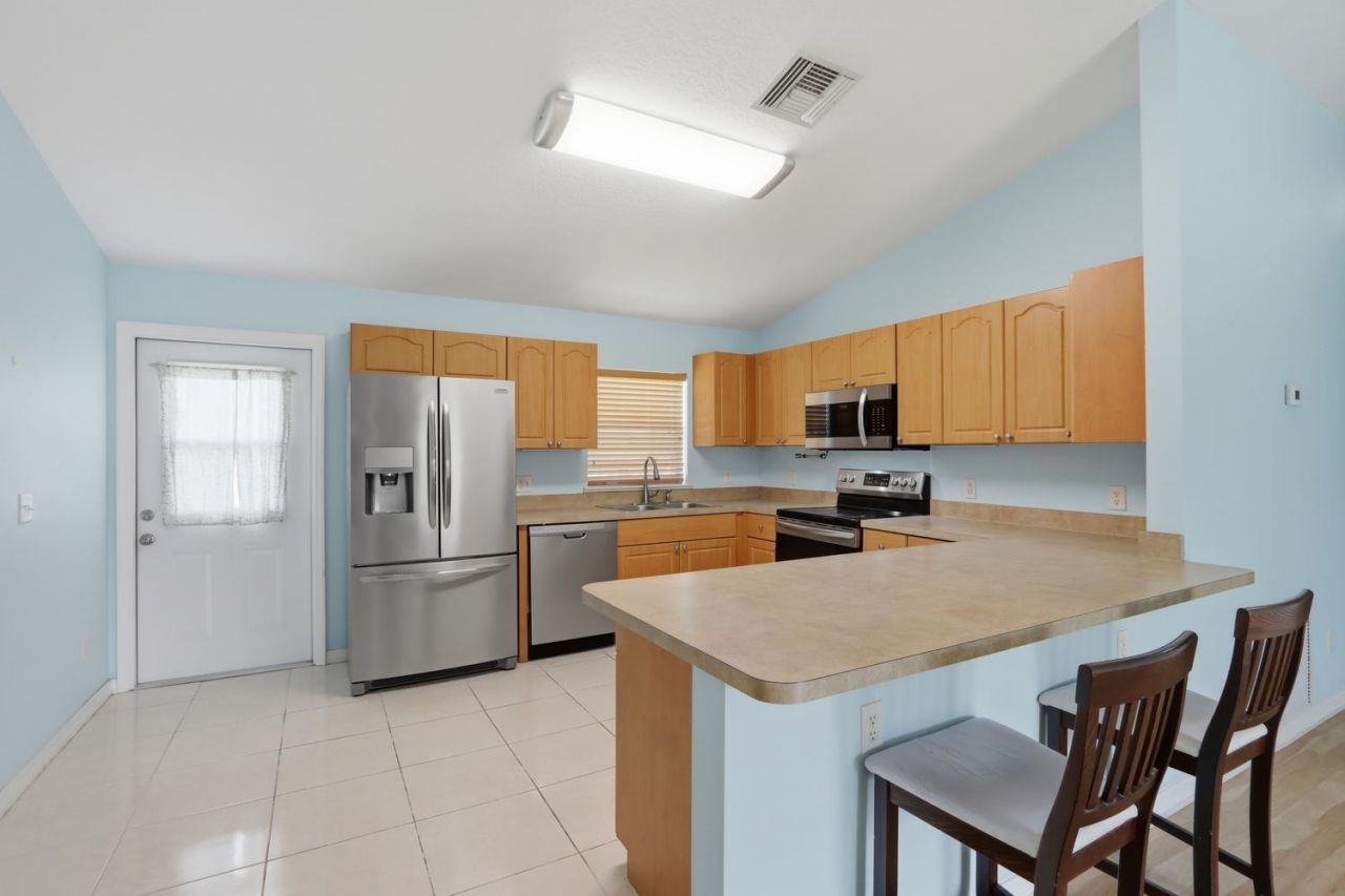 4461 SW Jaunt Road, Port Saint Lucie, FL 34953 Photo