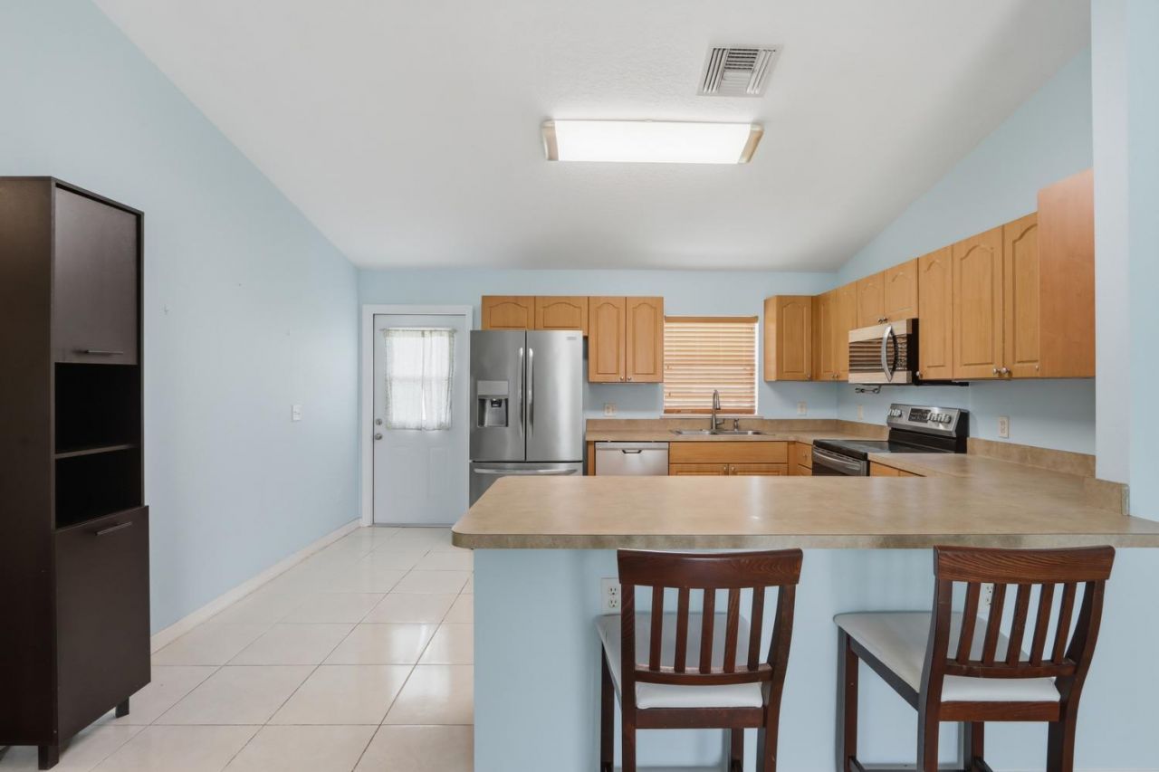 4461 SW Jaunt Road, Port Saint Lucie, FL 34953 Photo