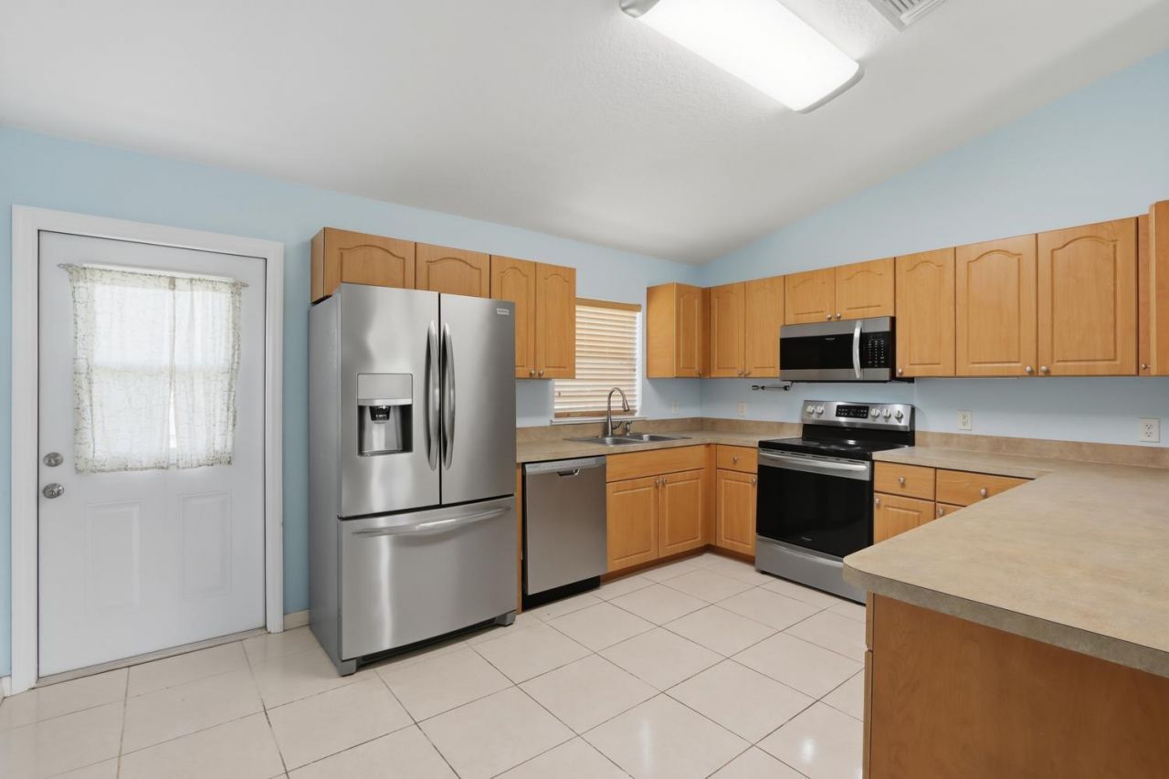 4461 SW Jaunt Road, Port Saint Lucie, FL 34953 Photo