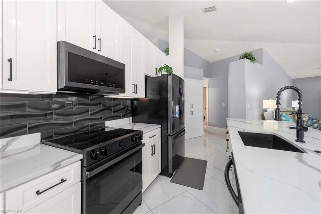 1619 SW 13th Ter, Cape Coral, FL 33991 Photo