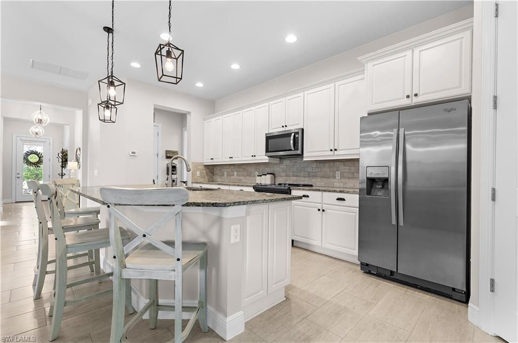 4111 Raffia Dr , Naples, FL 34119 Photo