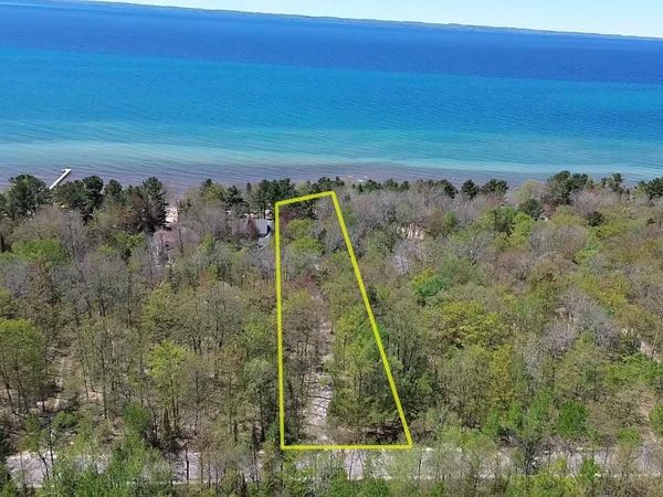 404 Golden Beach Drive, Kewadin, MI 00000