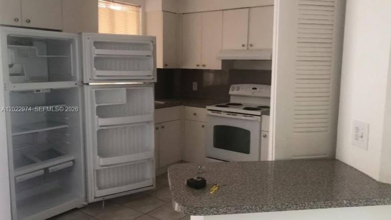 6155 NW 186th St , Unit 209, Hialeah, FL 33015 Photo