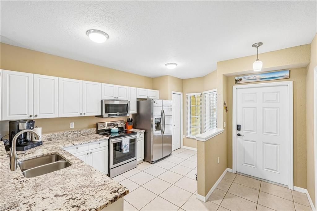 9185 Celeste Dr, Unit 1-103, Naples, FL 34113 Photo