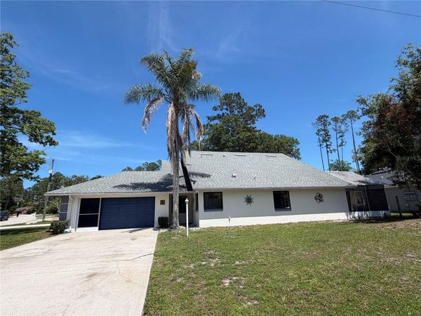 12 WELLWOOD LANE , Unit A, PALM COAST, FL 32164