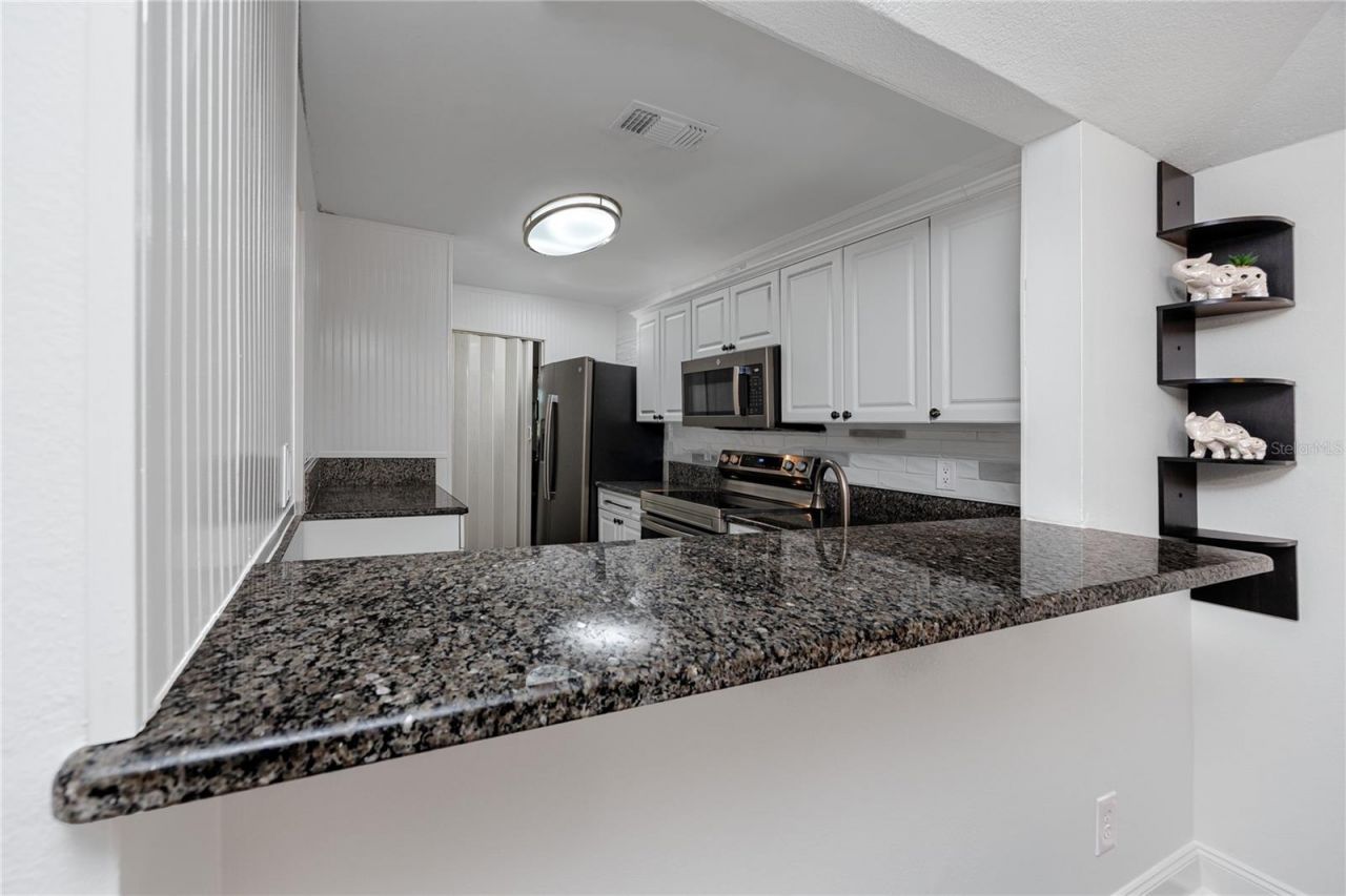 2101 Fox Chase Boulevard , Unit 107, Palm Harbor, FL 34683 Photo
