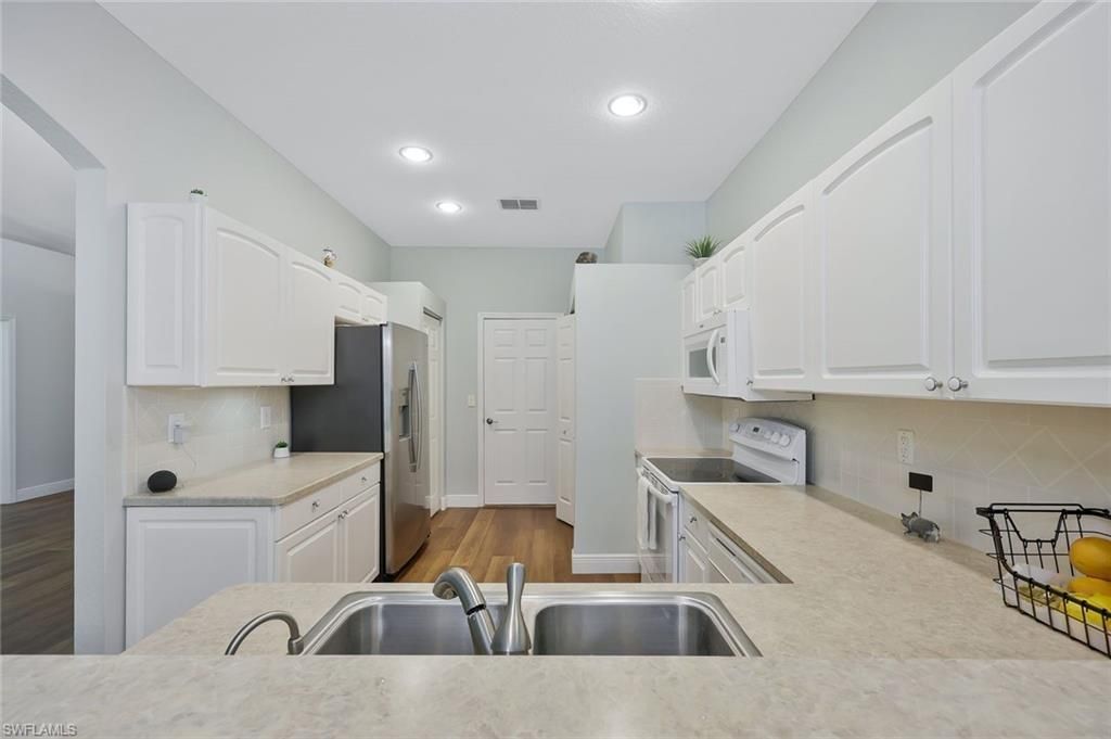 7416 Berkshire Pines Dr, Naples, FL 34104 Photo