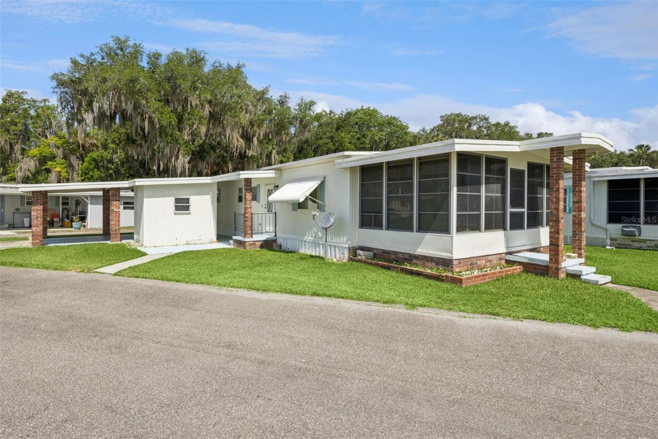 13 Cocos Plumosa Drive , Unit B, Eustis, FL 32726 Photo