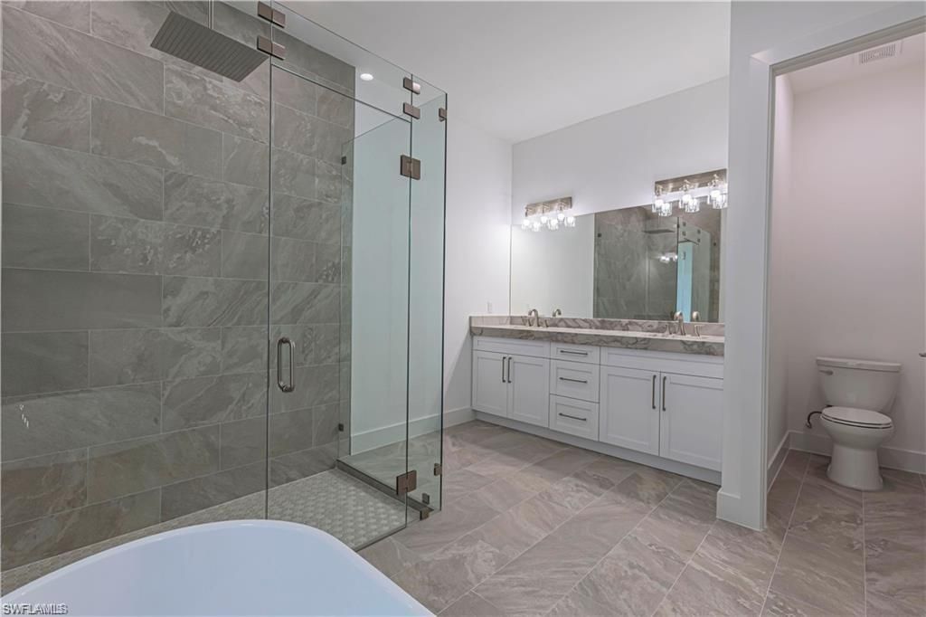 3098 Pine Tree Dr , Naples, FL 34112 Photo