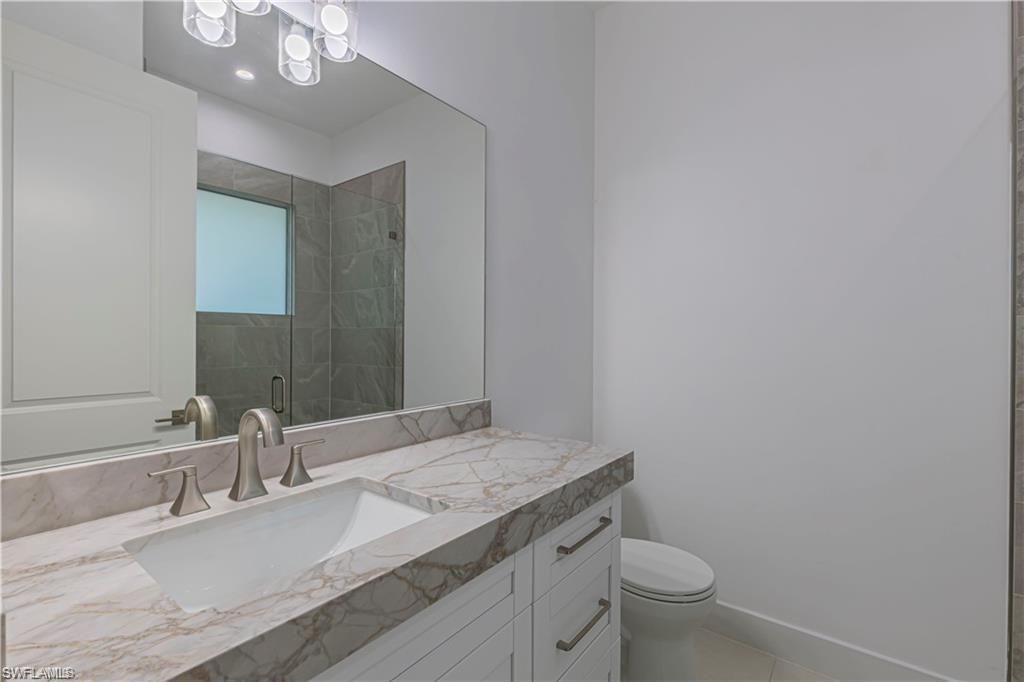 3098 Pine Tree Dr , Naples, FL 34112 Photo