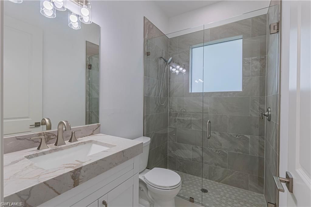 3098 Pine Tree Dr , Naples, FL 34112 Photo
