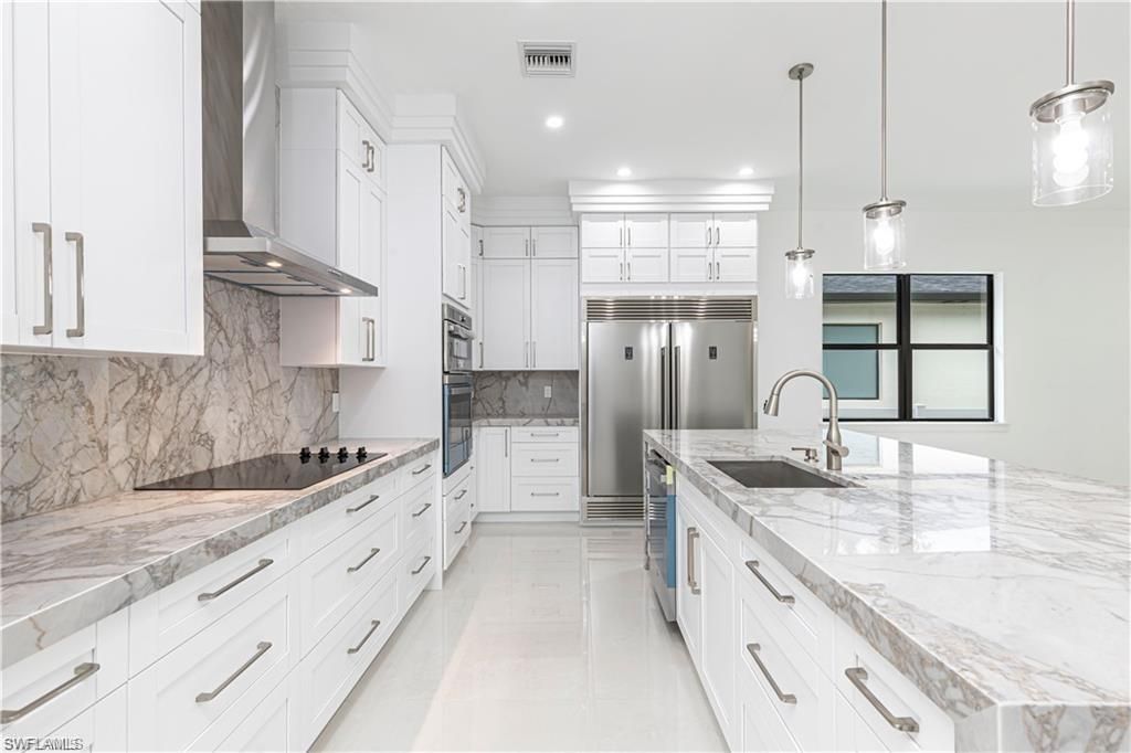 3098 Pine Tree Dr , Naples, FL 34112 Photo